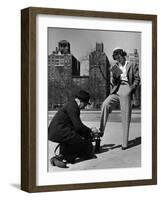 Model Showing Off Slacks as She Reads a First Aid Text Book in Washington Square Park-Nina Leen-Framed Photographic Print