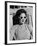 Model Stephanie Nikashian Sporting Sunglasses with "Seashell Rims" While Lounging at Beach-Alfred Eisenstaedt-Framed Photographic Print