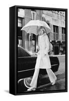 Model, Walking with an Umbrella by Givenchy-Kourken Pakchanian-Framed Stretched Canvas