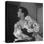 Model Wearing a Flowery Dress While Peering Into the Distance-Nina Leen-Stretched Canvas