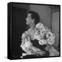 Model Wearing a Flowery Dress While Peering Into the Distance-Nina Leen-Framed Stretched Canvas