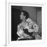 Model Wearing a Flowery Dress While Peering Into the Distance-Nina Leen-Framed Photographic Print