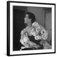 Model Wearing a Flowery Dress While Peering Into the Distance-Nina Leen-Framed Photographic Print