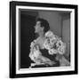 Model Wearing a Flowery Dress While Peering Into the Distance-Nina Leen-Framed Photographic Print