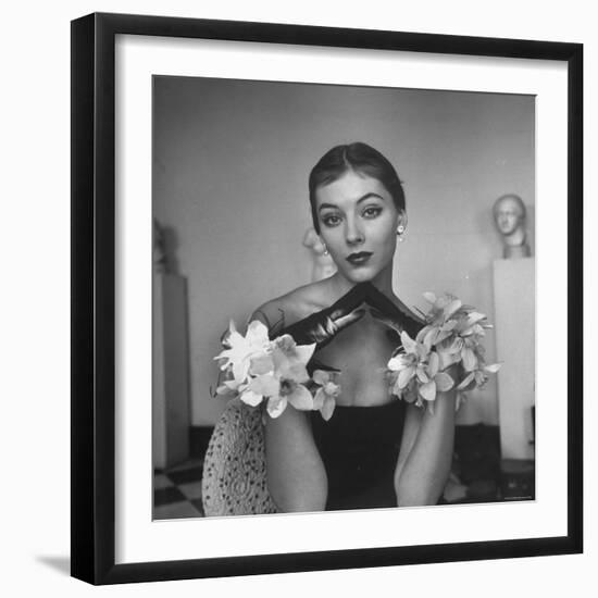 Model Wearing a Flowery Glove While Peering Into the Distance-Nina Leen-Framed Photographic Print