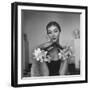 Model Wearing a Flowery Glove While Peering Into the Distance-Nina Leen-Framed Photographic Print