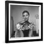 Model Wearing a Flowery Glove While Peering Into the Distance-Nina Leen-Framed Photographic Print