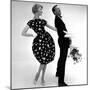 Model Wearing a Puff Ball Skirt and Escort with Roses, 1958-John French-Mounted Giclee Print