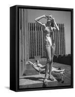 Model Wearing Sunglasses and Swim Suit Sunbathing on Roof of Rockefeller Center-Alfred Eisenstaedt-Framed Stretched Canvas