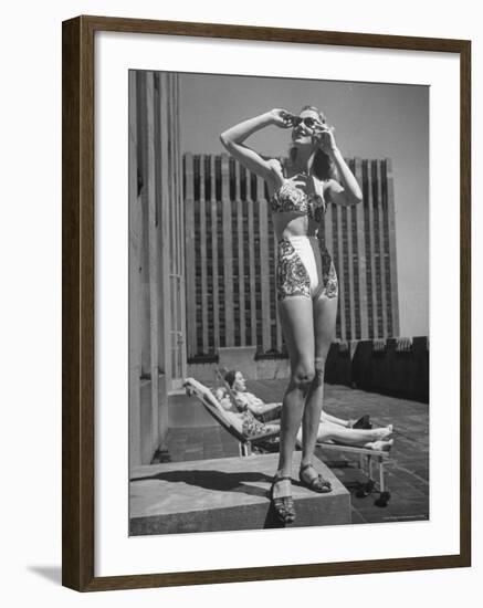 Model Wearing Sunglasses and Swim Suit Sunbathing on Roof of Rockefeller Center-Alfred Eisenstaedt-Framed Photographic Print