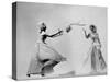 Model Wearing Wedding Gown Tossing Bouquet to Another Model Dresses as Bridesmaid-Gjon Mili-Stretched Canvas