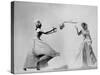 Model Wearing Wedding Gown Tossing Bouquet to Another Model Dresses as Bridesmaid-Gjon Mili-Stretched Canvas