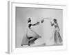 Model Wearing Wedding Gown Tossing Bouquet to Another Model Dresses as Bridesmaid-Gjon Mili-Framed Photographic Print