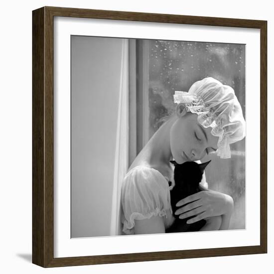 Model with Cap Embracing a Cat, 1960s-John French-Framed Giclee Print