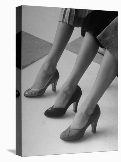 Models Displaying Different Styles of Shoes-Nina Leen-Stretched Canvas