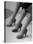 Models Displaying Different Styles of Shoes-Nina Leen-Stretched Canvas