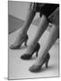 Models Displaying Different Styles of Shoes-Nina Leen-Mounted Photographic Print