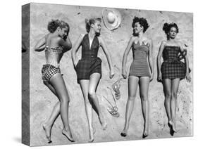 Models Lying on Beach to Display Bathing Suits-Nina Leen-Stretched Canvas