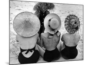 Models on Beach Wearing Different Designs of Straw Hats-Nina Leen-Mounted Photographic Print