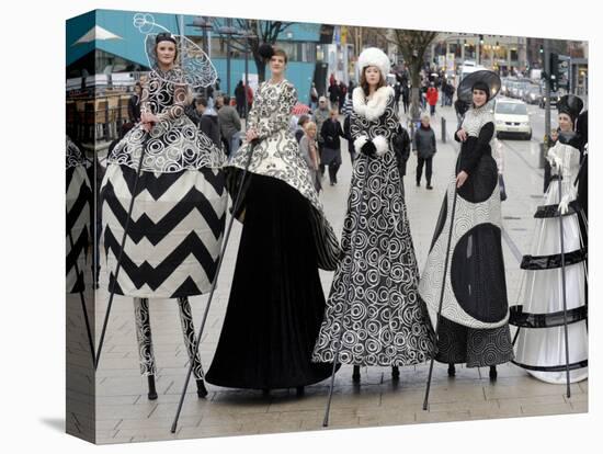 Models on Stilts Present "High Fashion" on the Famous "Jungfernstieg" Boulevard in Hamburg, Germany-null-Stretched Canvas