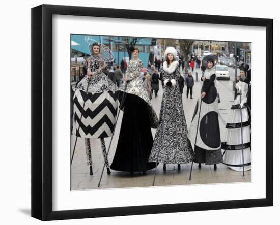 Models on Stilts Present "High Fashion" on the Famous "Jungfernstieg" Boulevard in Hamburg, Germany-null-Framed Photographic Print