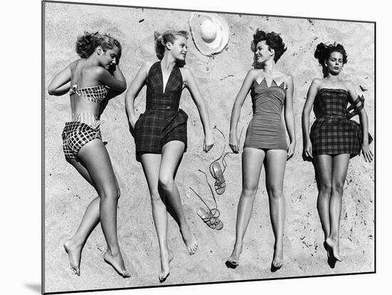 Models Sunbathing, Wearing Latest Beach Fashions-Nina Leen-Mounted Photographic Print