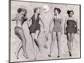 Models Sunbathing, Wearing Latest Beach Fashions-Nina Leen-Mounted Premium Photographic Print