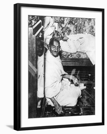 Mohondas Karamchand Gandhi (1869-194), Working at His Spinning Wheel-null-Framed Giclee Print