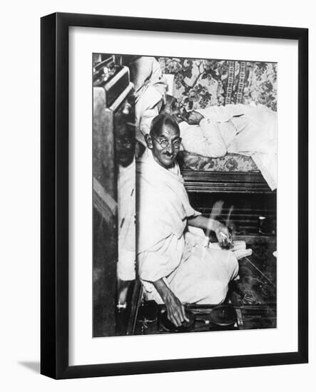 Mohondas Karamchand Gandhi (1869-194), Working at His Spinning Wheel-null-Framed Giclee Print