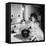 Mom Prepares Dinner with the Kids Watching, Ca. 1962-null-Framed Stretched Canvas