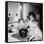 Mom Prepares Dinner with the Kids Watching, Ca. 1962-null-Framed Stretched Canvas