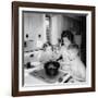 Mom Prepares Dinner with the Kids Watching, Ca. 1962-null-Framed Photographic Print