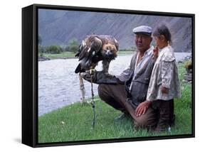 Mongolia, Kasakh Hunter with Eagle by the Khovd River, with a Small Child-Antonia Tozer-Framed Stretched Canvas