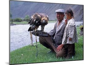 Mongolia, Kasakh Hunter with Eagle by the Khovd River, with a Small Child-Antonia Tozer-Mounted Photographic Print