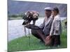 Mongolia, Kasakh Hunter with Eagle by the Khovd River, with a Small Child-Antonia Tozer-Mounted Photographic Print