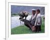 Mongolia, Kasakh Hunter with Eagle by the Khovd River, with a Small Child-Antonia Tozer-Framed Photographic Print
