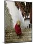 Monk Carrying Basket in Trongsa Dzong, Bhutan-Keren Su-Mounted Photographic Print