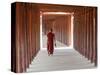 Monk in Walkway of Wooden Pillars To Temple, Salay, Myanmar (Burma)-Peter Adams-Stretched Canvas