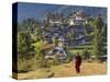 Monk Leaving Gangtey Dzong, and Village, Phobjikha Valley, Bhutan-Peter Adams-Stretched Canvas