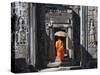 Monk with Buddhist Statues in Banteay Kdei, Cambodia-Keren Su-Stretched Canvas