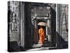 Monk with Buddhist Statues in Banteay Kdei, Cambodia-Keren Su-Stretched Canvas