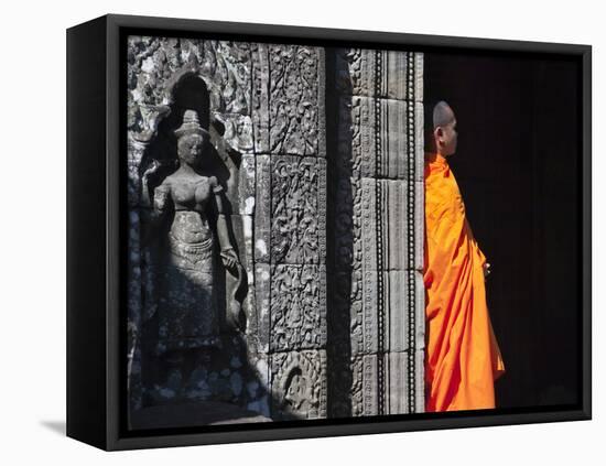 Monk with Buddhist Statues in Banteay Kdei, Cambodia-Keren Su-Framed Stretched Canvas