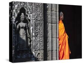 Monk with Buddhist Statues in Banteay Kdei, Cambodia-Keren Su-Stretched Canvas