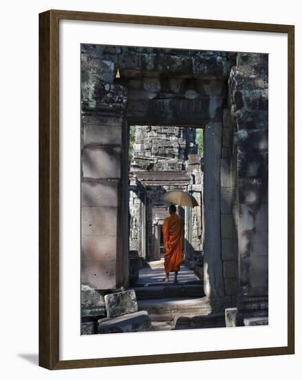 Monk with Buddhist Statues in Banteay Kdei, Cambodia-Keren Su-Framed Premium Photographic Print