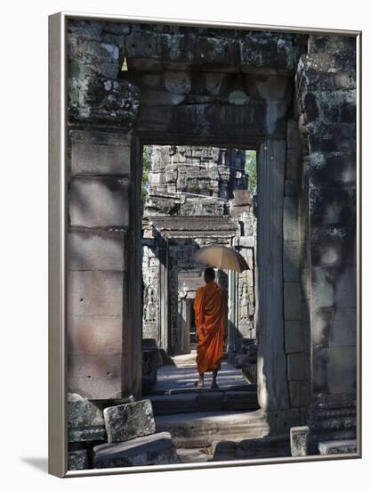 Monk with Buddhist Statues in Banteay Kdei, Cambodia-Keren Su-Framed Photographic Print