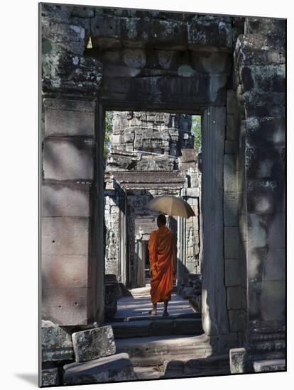 Monk with Buddhist Statues in Banteay Kdei, Cambodia-Keren Su-Mounted Photographic Print