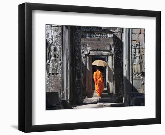 Monk with Buddhist Statues in Banteay Kdei, Cambodia-Keren Su-Framed Photographic Print