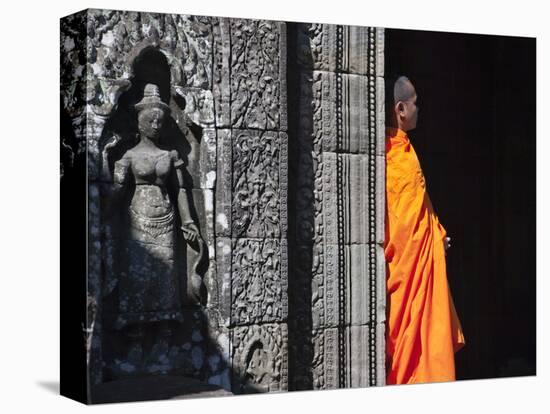 Monk with Buddhist Statues in Banteay Kdei, Cambodia-Keren Su-Stretched Canvas