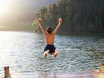 Young Boy Jumping into Lake-Monkey Business Images-Photographic Print