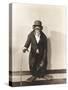 Monkey Dressed in Tight Overcoat and Bowler Hat-null-Stretched Canvas